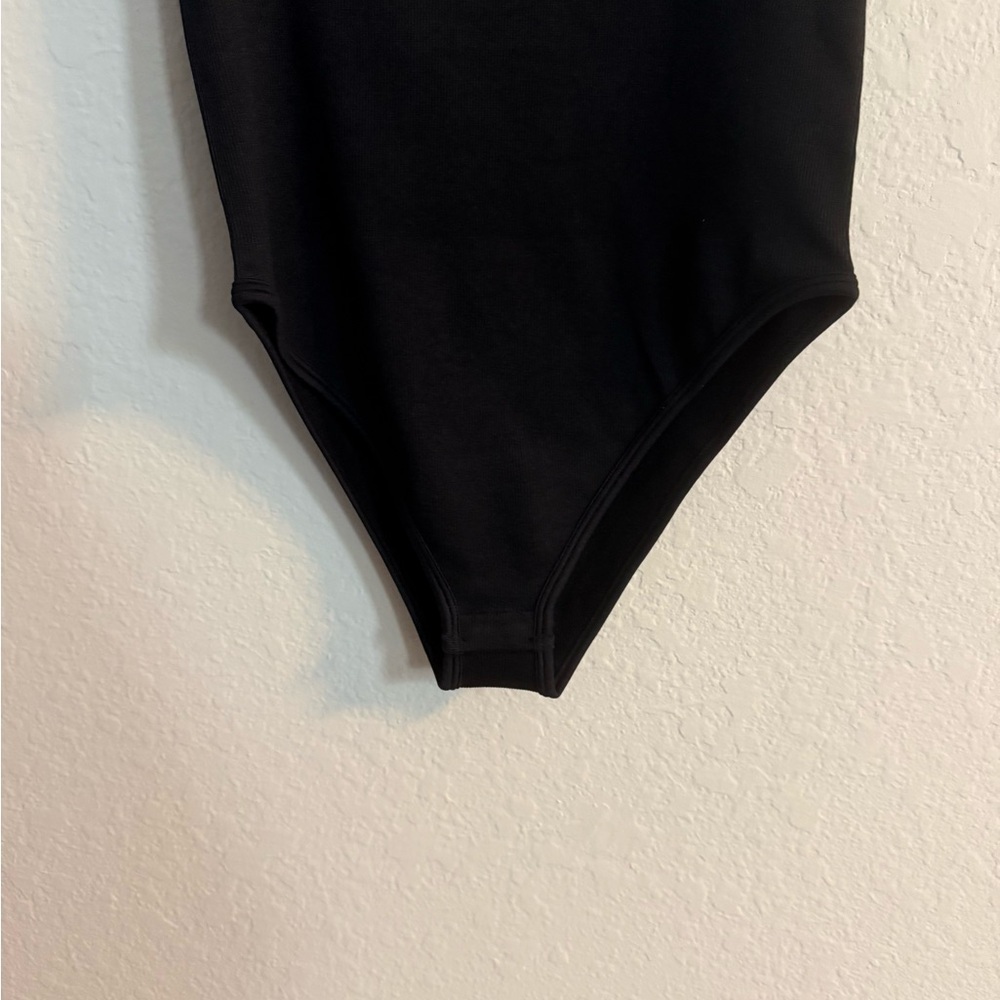 OQQ Black Ruffled Flutter Sleeve Ribbed Bodysuit - Picture 5 of 6